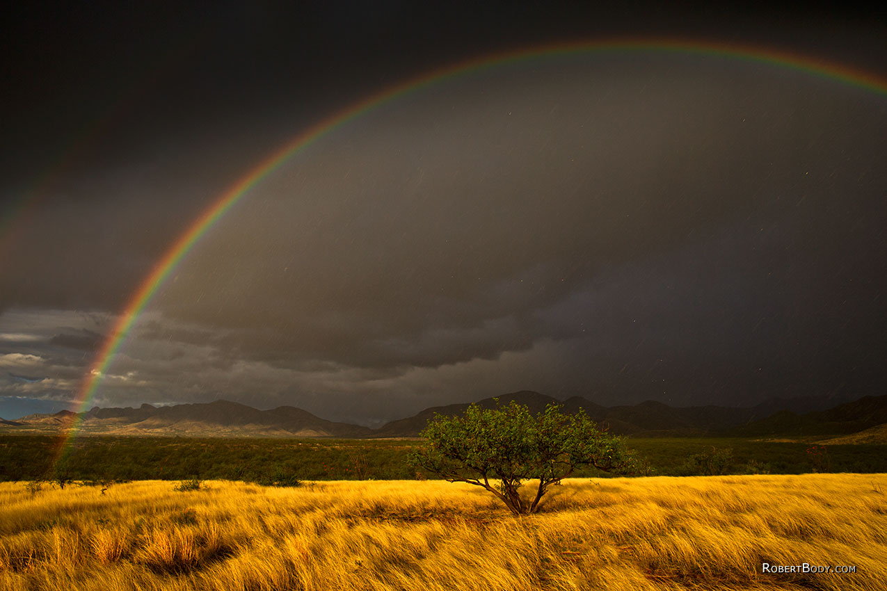 Sun and rain and rainbow