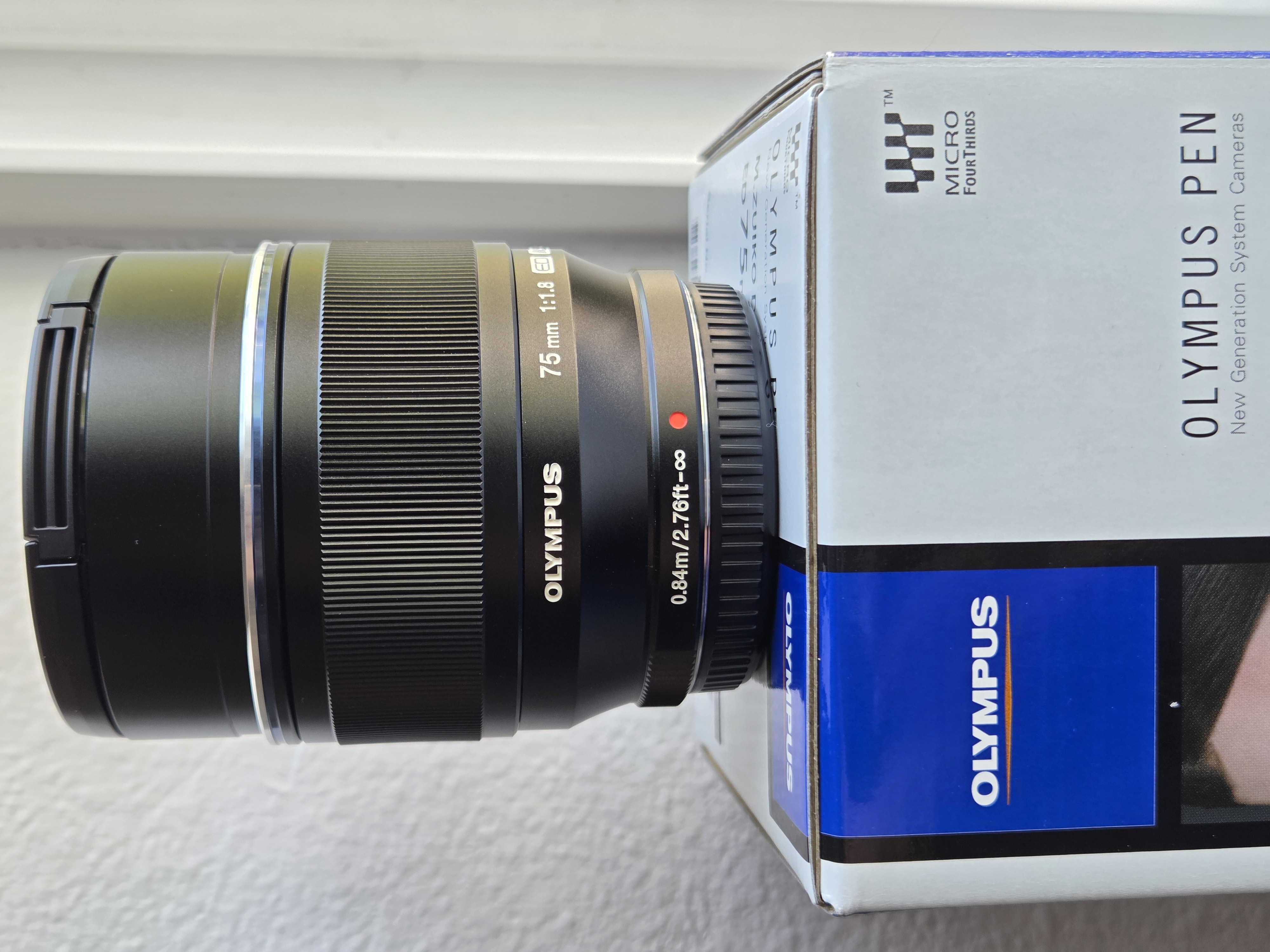 Olympus 75mm f1.8 (black) like new