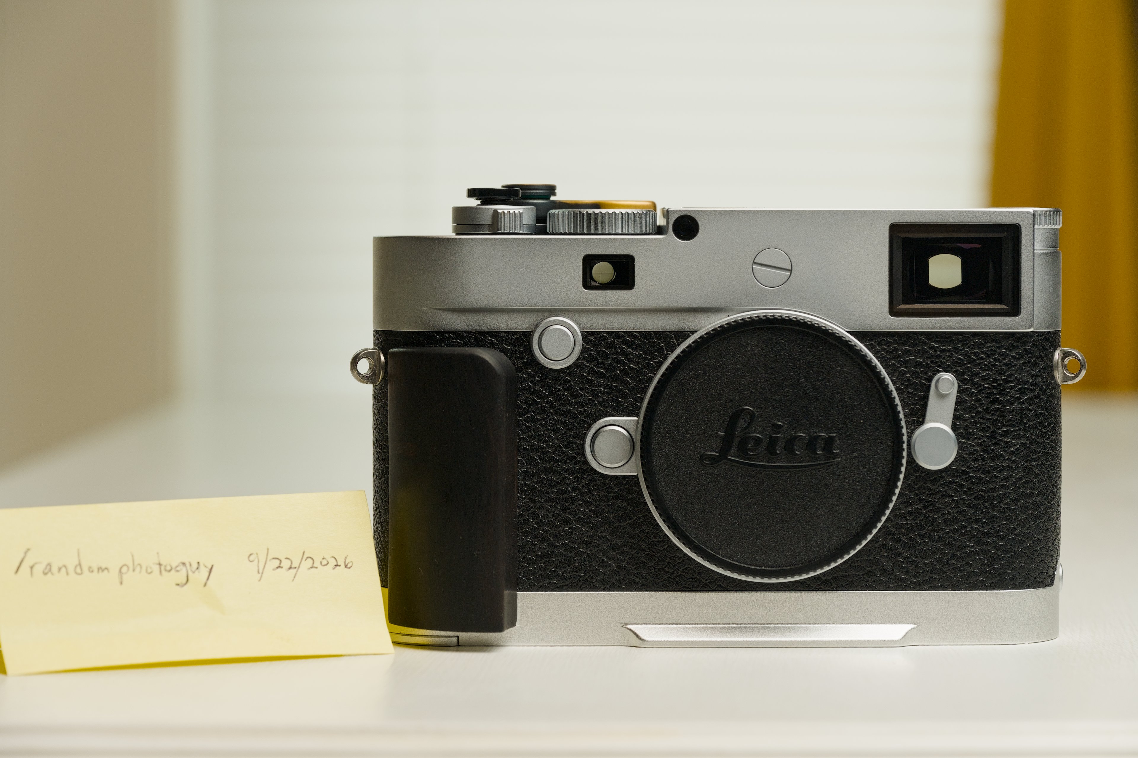 Leica M10-P in silver with IDSWorks foldable grip and Ebon...