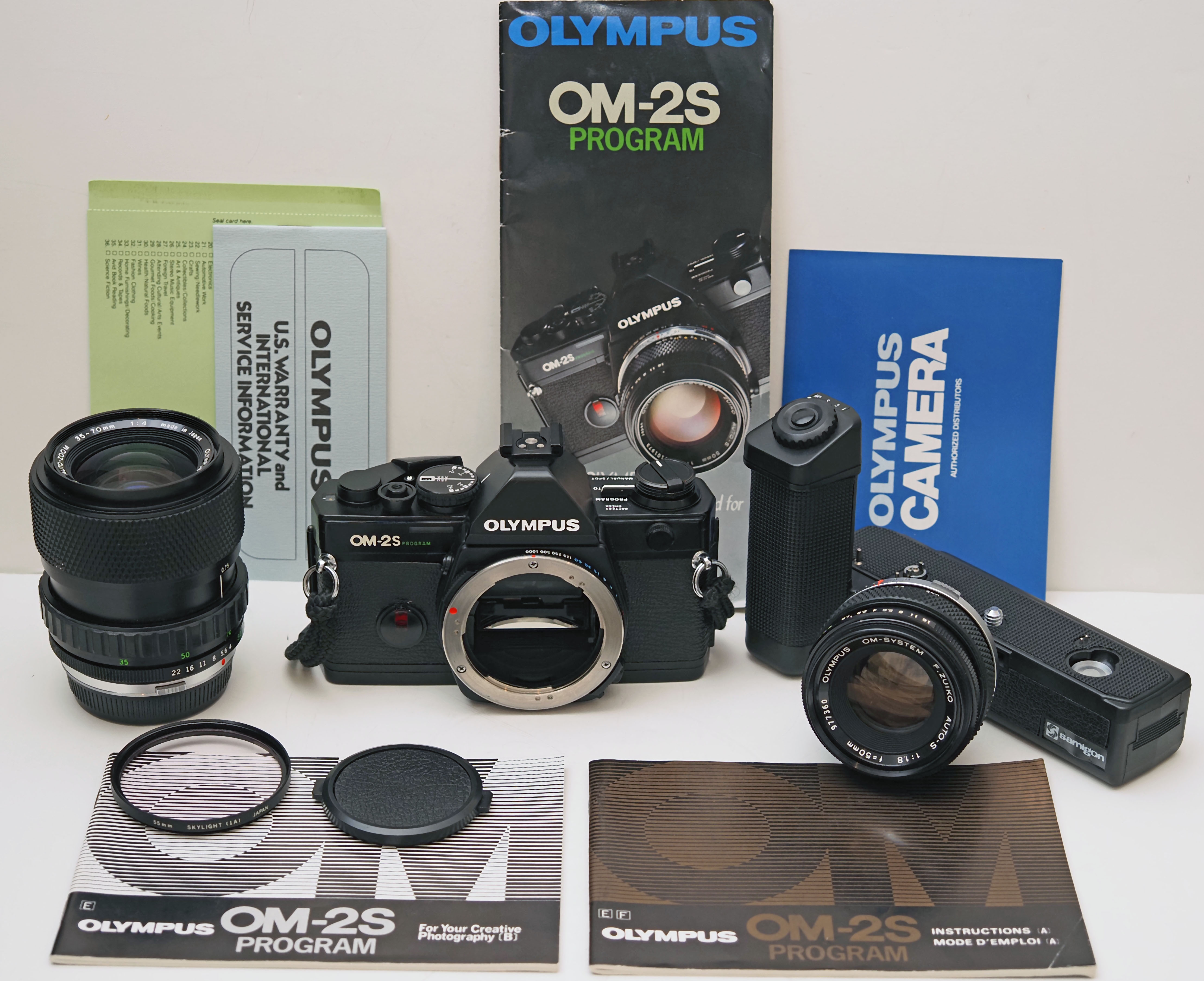 Olympus OM-2S Program 50mm 1.8 and 35-70mm 75-250mm lens...
