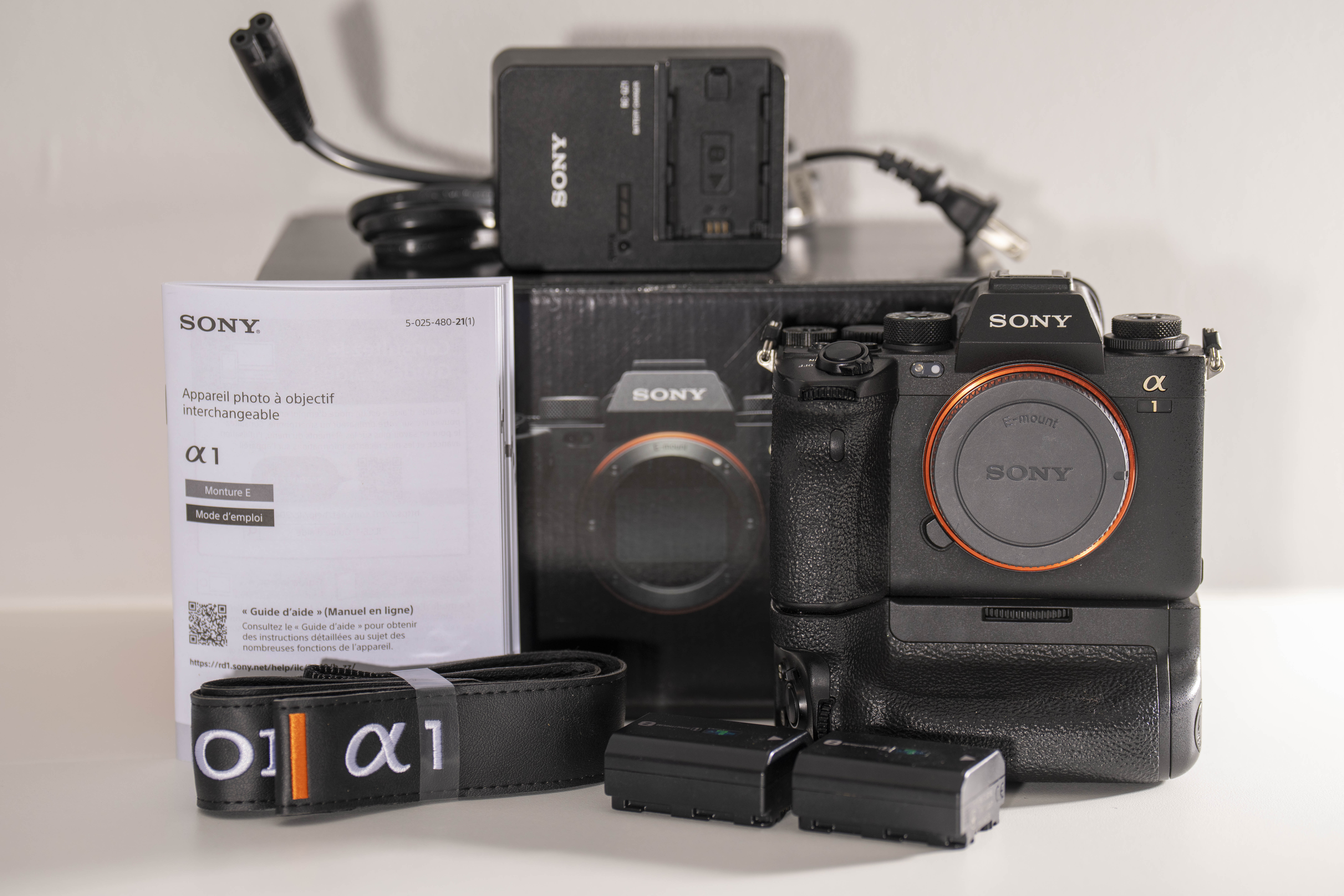 Sony A1 w/ 2 batteries, 2 charges and vertical grip