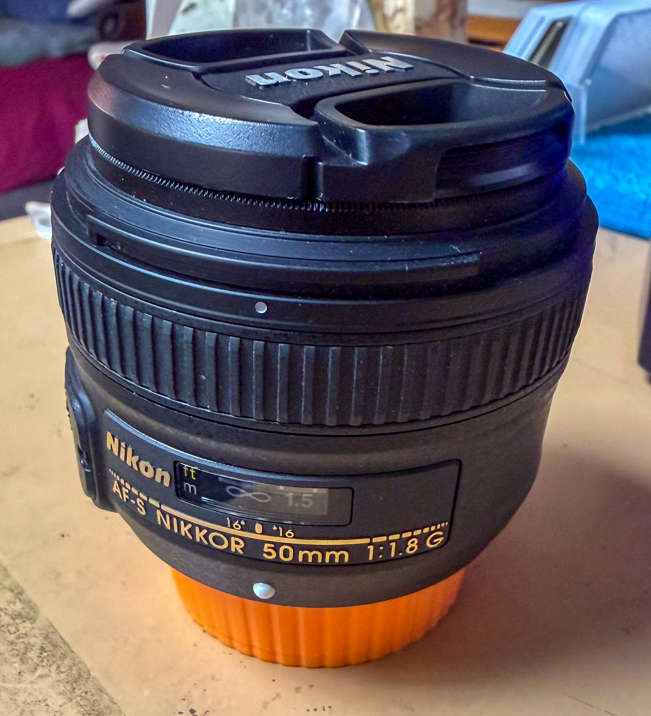 Nikon AF-S NIKKOR 50mm f/1.8G lens with caps, MC UV filter
