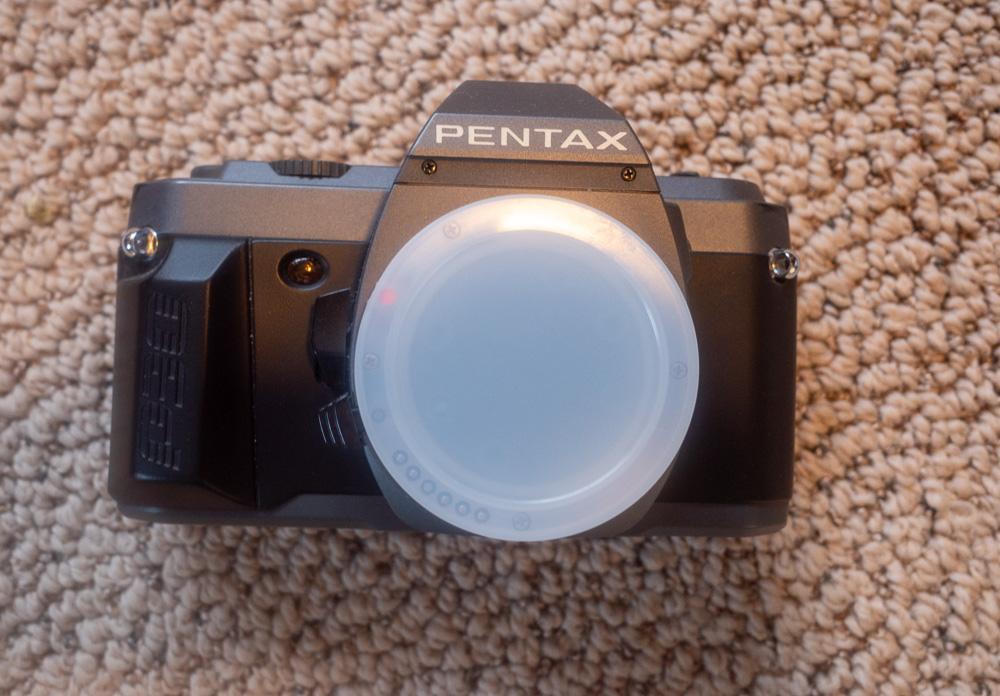 Sold Pentax P30t (film 35mm camera) with 135mm f3.5 Pentax K lens FM