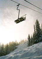 Chairlift and sun