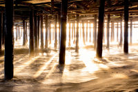 Sun rays through the pier