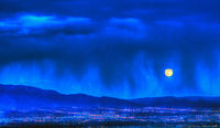 Moonrise and verga over Albuquerque